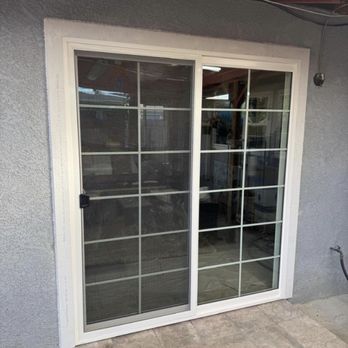Sliding glass door with grid pattern East Bay